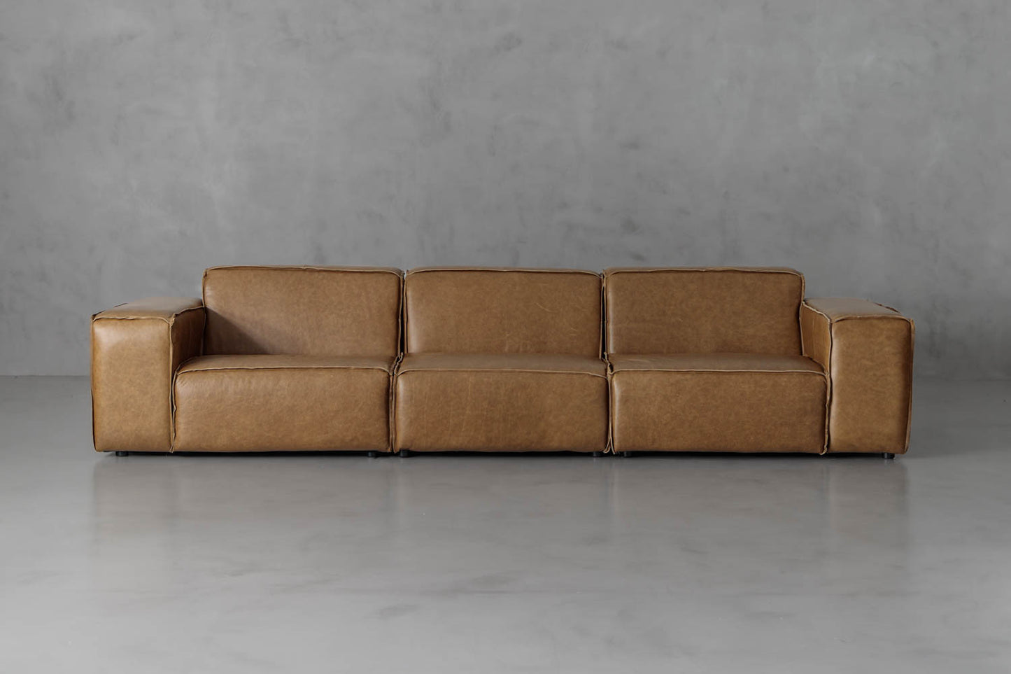 Sofá en Cuero "CONGO + PUFF"